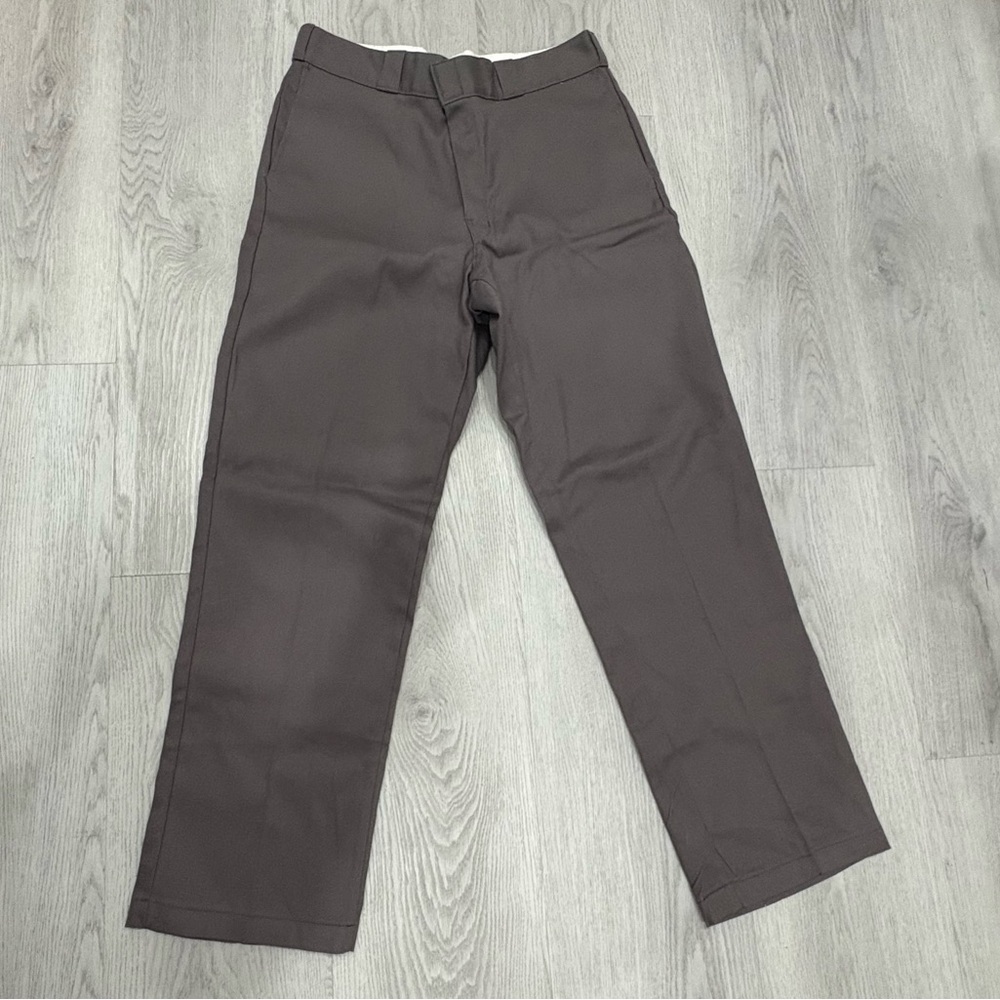 Dickies work pants in a very durable stone pebble color material size 36/32